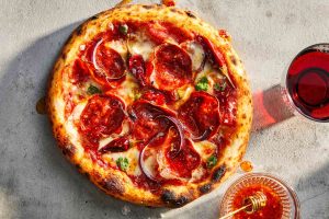 Innovative pizza recipes blending classic Italian and exotic global tastes Innovative pizza recipes blending classic Italian and exotic global tastes